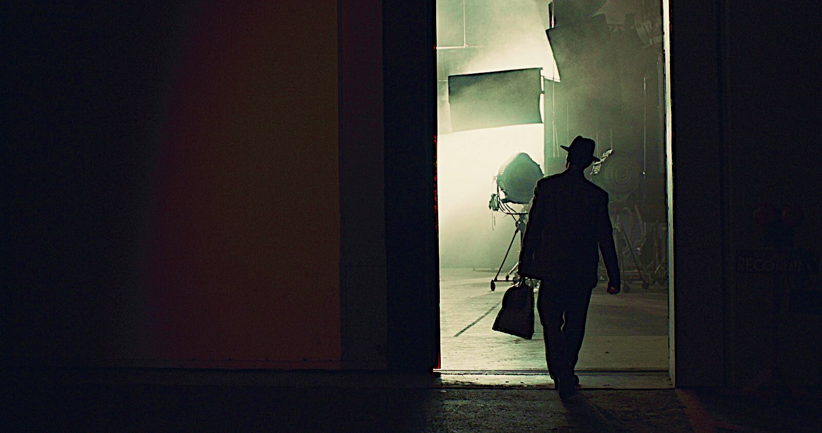 Henry Ian Cusick as Luis de Ossario, a silhouette entering an empty soundstage at night