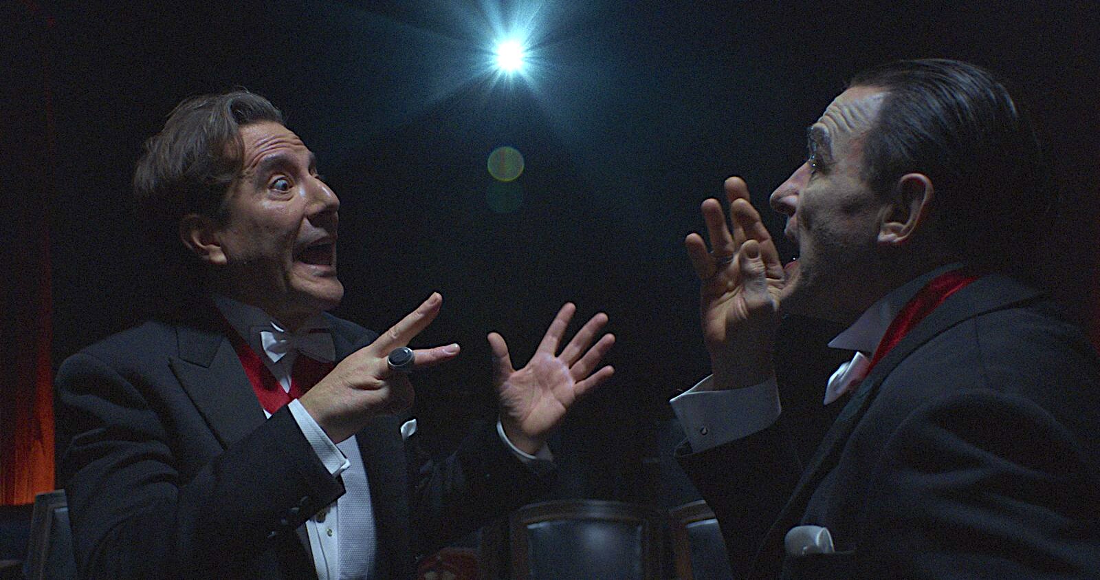 Henry Ian Cusick and Thomas Kretschmann face each other in full vampire costume